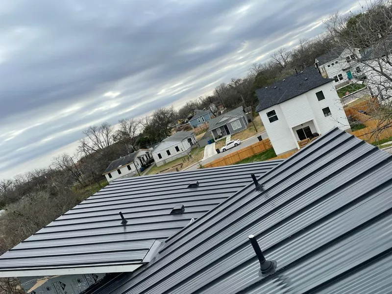 Standing seam metal roof panels with vents for Skylight Repair in West Odessa